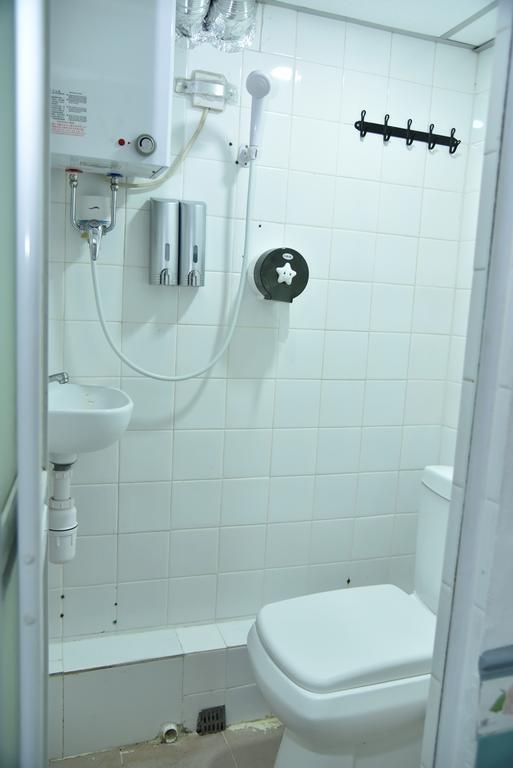 Jas Guest House Гонконг Номер фото