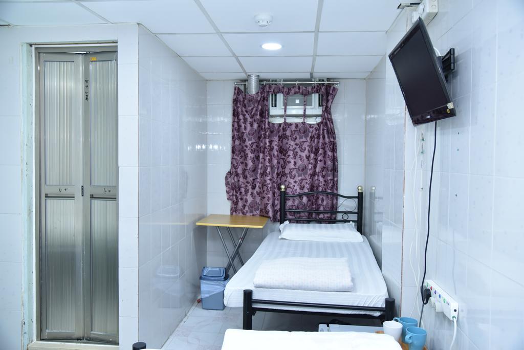 Jas Guest House Гонконг Номер фото